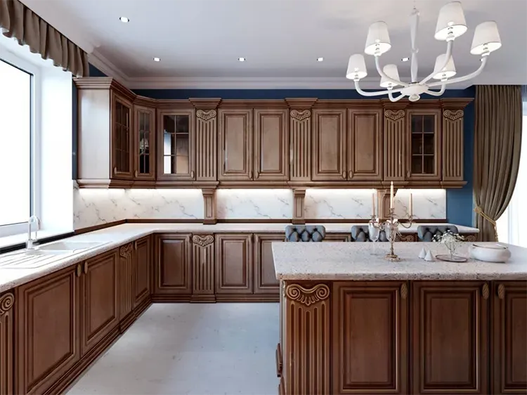 Kitchen with dark stained raised-panel wood cabinets and island, with a fresh stain by Elegant Edge Painting.